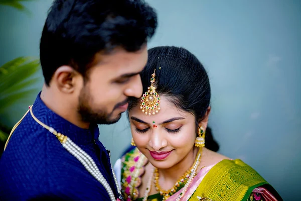 Amrutha and Gowtham Sushruth in a close engagement portrait